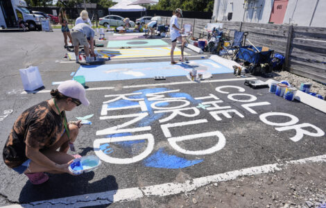 Parking spots used as colorful protest against Florida crackdown on rainbow crosswalks